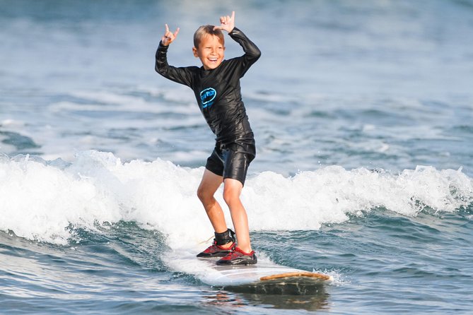 2 Hour Beginner Group Surf Lessons - Equipment and comfort: rash guards and reef shoes