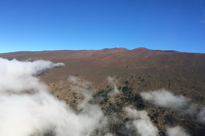 Complete Island 60-Minute Helicopter Tour - Window seats, photos, and why dark clothing is not just marketing