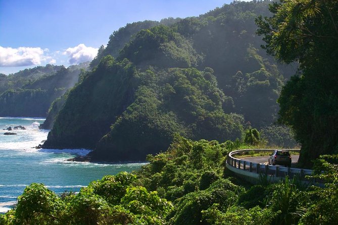 Maui: Road to Hana Adventure with Farm to Table Lunch - Waterfall walls near Hana: stunning views, variable conditions