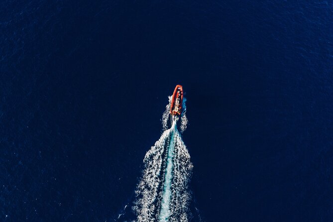 Maui South Coast and Molokini Crater Adventure from Kihei - Molokini Crater, front wall snorkeling with breakfast in hand