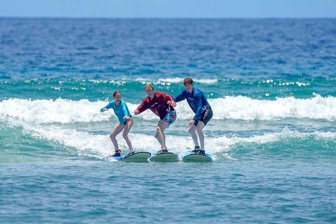 Semi Private Surf Lessons with Experienced Coaches - Boards, booties, and rash guards: included for a reason