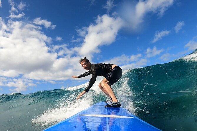 Surf Lesson on Maui - The 1.5-hour rhythm: land warm-up, skills practice, then wave coaching
